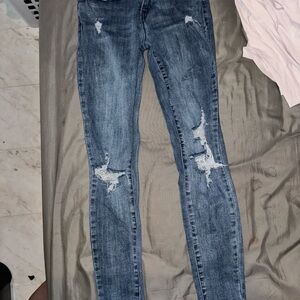 Trendy Distressed Skinny Jeans in Blue